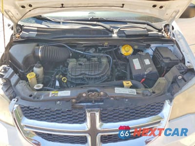 Zdjęcie 12 z 13 samochodu: 2014 DODGE GRAND CARAVAN SE VIN:2C4RDGBG1ER452535 - miniatura