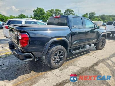 Trzecie zdjęcie samochodu z tyłu: 2024 GMC CANYON ELEVATION VIN:1GTP6BEK0R1267309 - miniatura