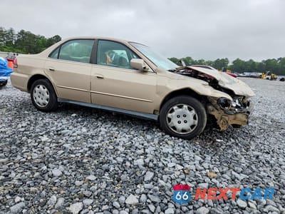 Czwarte zdjęcie samochodu z boku: 2002 HONDA ACCORD LX VIN:1HGCG564X2A090143 - miniatura