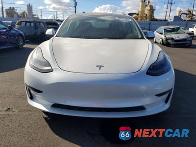 Piąte zdjęcie samochodu w środku: 2022 TESLA MODEL 3 VIN:5YJ3E1EB8NF137548 - miniatura