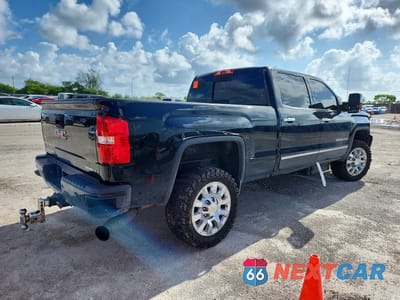 Trzecie zdjęcie samochodu z tyłu: 2016 GMC SIERRA K2500 DENALI VIN:1GT12UE85GF298248 - miniatura