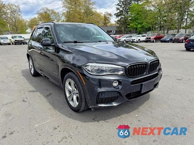 Czwarte zdjęcie samochodu z boku: 2015 BMW X5 XDRIVE50I VIN:5UXKR6C54F0J74895 - miniatura