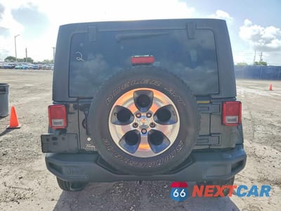 Zdjęcie 6 z 14 samochodu: 2016 JEEP WRANGLER UNLIMITED SAHARA VIN:1C4BJWEG1GL283693 - miniatura