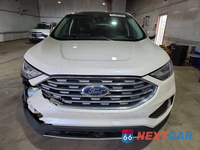Piąte zdjęcie samochodu w środku: 2019 FORD EDGE TITANIUM VIN:2FMPK4K93KBB87310 - miniatura