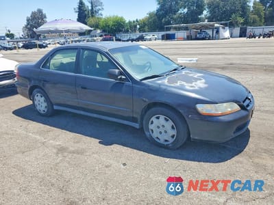 Czwarte zdjęcie samochodu z boku: 1999 HONDA ACCORD LX VIN:JHMCG5544XC035827 - miniatura