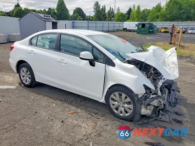 Czwarte zdjęcie samochodu z boku: 2012 HONDA CIVIC LX VIN:19XFB2F55CE312944 - miniatura