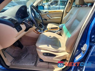 Zdjęcie 7 z 13 samochodu: 2002 BMW X5 3.0I VIN:5UXFA53532LP39519 - miniatura