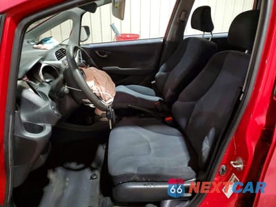 Zdjęcie 7 z 13 samochodu: 2009 HONDA FIT SPORT VIN:JHMGE88489S044236 - miniatura