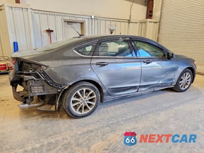 Trzecie zdjęcie samochodu z tyłu: 2017 FORD FUSION SE HYBRID VIN:3FA6P0LU4HR250671 - miniatura