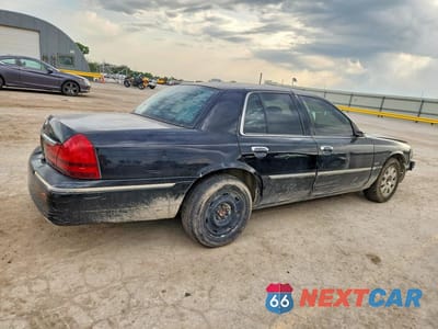 Trzecie zdjęcie samochodu z tyłu: 2003 MERCURY GRAND MARQUIS LS VIN:2MEFM75W83X663535 - miniatura