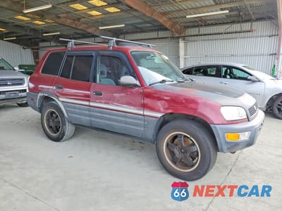 Czwarte zdjęcie samochodu z boku: 1998 TOYOTA RAV4 BASE VIN:JT3GP10V3W0032529 - miniatura