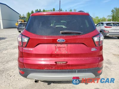Zdjęcie 6 z 14 samochodu: 2018 FORD ESCAPE SEL VIN:1FMCU9HDXJUA95573 - miniatura