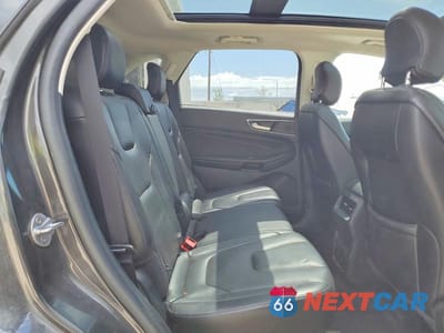 Zdjęcie 11 z 13 samochodu: 2019 FORD EDGE TITANIUM VIN:2FMPK4K97KBB86192 - miniatura