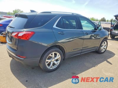 Trzecie zdjęcie samochodu z tyłu: 2018 CHEVROLET EQUINOX LT VIN:3GNAXKEX3JS607934 - miniatura