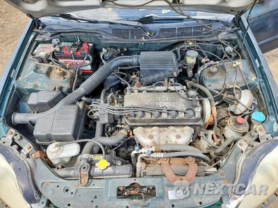 Zdjęcie 21 z 26 samochodu: 1999 HONDA CIVIC LX VIN:2HGEJ6670XH560411 - miniatura
