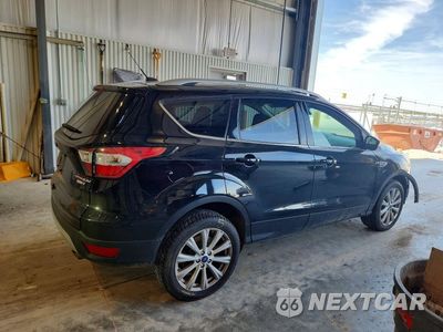 Trzecie zdjęcie samochodu z tyłu: 2017 FORD ESCAPE TITANIUM VIN:1FMCU9JD4HUD02401 - miniatura