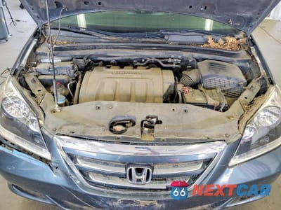 Zdjęcie 12 z 13 samochodu: 2005 HONDA ODYSSEY EXL VIN:5FNRL38705B136848 - miniatura