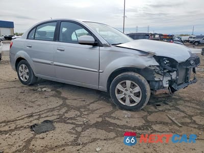 Czwarte zdjęcie samochodu z boku: 2011 KIA RIO LX VIN:KNADH4A32B6738177 - miniatura