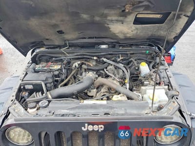 Zdjęcie 12 z 13 samochodu: 2010 JEEP WRANGLER UNLIMITED SAHARA VIN:1J4BA5H19AL162283 - miniatura