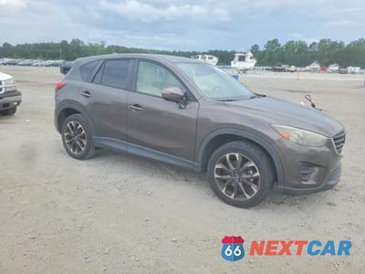 Czwarte zdjęcie samochodu z boku: 2016 MAZDA CX-5 GT VIN:JM3KE2DY9G0714717 - miniatura