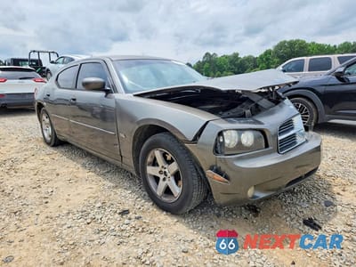 Czwarte zdjęcie samochodu z boku: 2010 DODGE CHARGER VIN:2B3CA3CV3AH122188 - miniatura