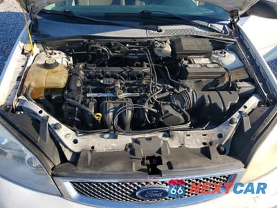 Zdjęcie 11 z 12 samochodu: 2007 FORD FOCUS ZX5 VIN:1FAFP37N07W313796 - miniatura