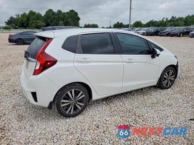 Trzecie zdjęcie samochodu z tyłu: 2016 HONDA FIT EX VIN:JHMGK5H70GX041512 - miniatura