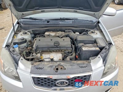 Zdjęcie 11 z 12 samochodu: 2010 KIA RIO BASE VIN:KNADH4A33A6680109 - miniatura