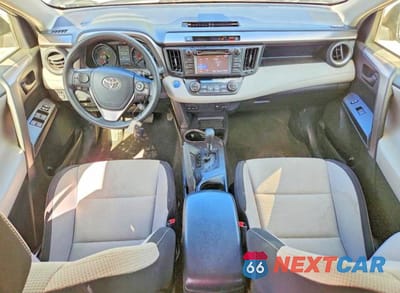 Zdjęcie 8 z 13 samochodu: 2018 TOYOTA RAV4 HYBRID LE VIN:JTMRJREV1JD259295 - miniatura