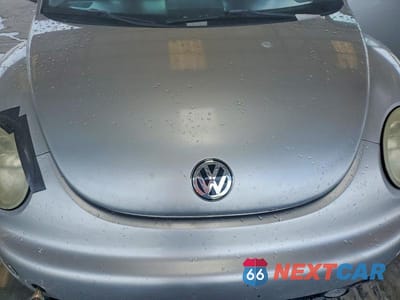 Zdjęcie 11 z 12 samochodu: 2001 VOLKSWAGEN NEW BEETLE GLS SPORT VIN:3VWED21C51M477923 - miniatura