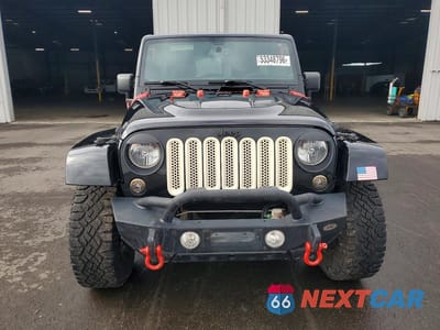 Piąte zdjęcie samochodu w środku: 2015 JEEP WRANGLER UNLIMITED SAHARA VIN:1C4HJWEG5FL614235 - miniatura