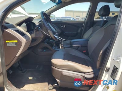 Zdjęcie 7 z 13 samochodu: 2011 HYUNDAI TUCSON GLS VIN:KM8JU3AC3BU314543 - miniatura