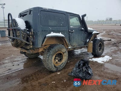 Trzecie zdjęcie samochodu z tyłu: 2015 JEEP WRANGLER SPORT VIN:1C4AJWAGXFL661297 - miniatura