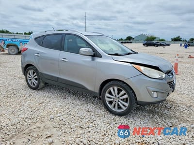 Czwarte zdjęcie samochodu z boku: 2013 HYUNDAI TUCSON LIMITED VIN:KM8JU3ACXDU581536 - miniatura