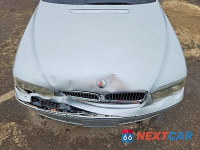 Zdjęcie 11 z 12 samochodu: 2003 BMW 745 LI VIN:WBAGN63443DR08690 - miniatura