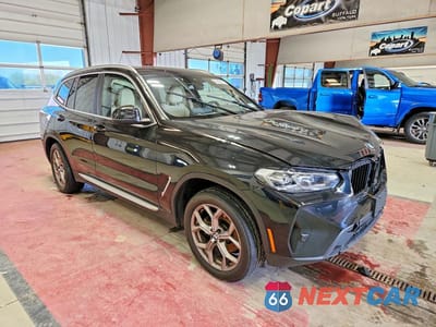 Czwarte zdjęcie samochodu z boku: 2022 BMW X3 XDRIVE30I VIN:5UX53DP07N9K73772 - miniatura