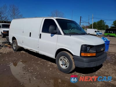 Czwarte zdjęcie samochodu z boku: 2014 CHEVROLET EXPRESS G3500 VIN:1GCZGUBAXE1131728 - miniatura
