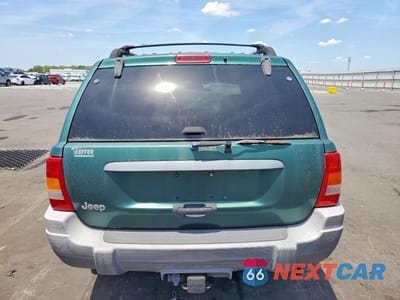 Zdjęcie 6 z 13 samochodu: 1999 JEEP GRAND CHEROKEE LAREDO VIN:1J4GW58S6XC569065 - miniatura