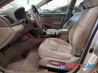 Zdjęcie 7 z 12 samochodu: 2002 TOYOTA CAMRY XLE VIN:4T1BE32KX2U520384 - miniatura