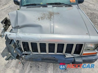 Zdjęcie 12 z 14 samochodu: 2000 JEEP CHEROKEE SPORT VIN:1J4FF48S3YL196574 - miniatura