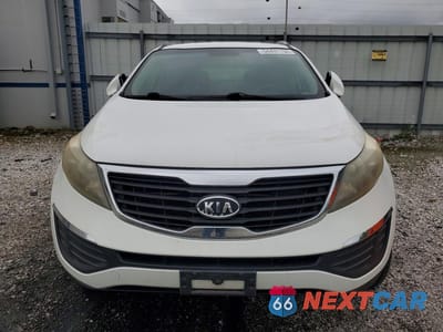 Piąte zdjęcie samochodu w środku: 2012 KIA SPORTAGE LX VIN:KNDPB3A22C7330888 - miniatura