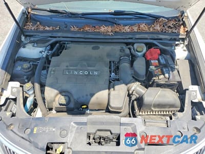Zdjęcie 11 z 12 samochodu: 2015 LINCOLN MKS VIN:1LNHL9DK3FG603448 - miniatura