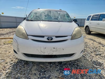 Piąte zdjęcie samochodu w środku: 2010 TOYOTA SIENNA LE 7-PASSENGER VIN:5TDKK4CC9AS320397 - miniatura