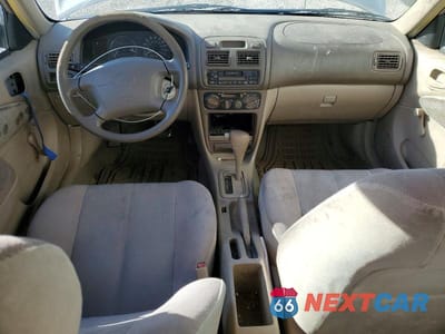 Zdjęcie 8 z 12 samochodu: 1999 TOYOTA COROLLA VE VIN:1NXBR12E6XZ242979 - miniatura