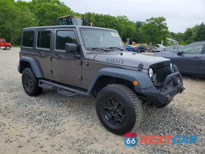 Czwarte zdjęcie samochodu z boku: 2014 JEEP WRANGLER UNLIMITED SPORT VIN:1C4BJWDGXEL267801 - miniatura