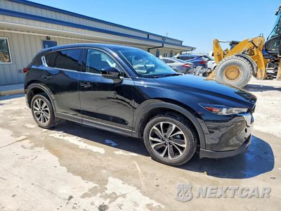 Czwarte zdjęcie samochodu z boku: 2023 MAZDA CX-5 PREMIUM VIN:JM3KFBDM5P0192310 - miniatura