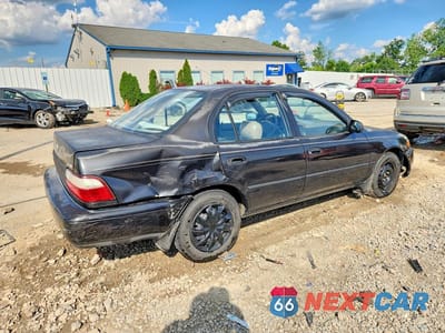 Trzecie zdjęcie samochodu z tyłu: 1996 TOYOTA COROLLA BASE VIN:2T1BA02E8TC135266 - miniatura