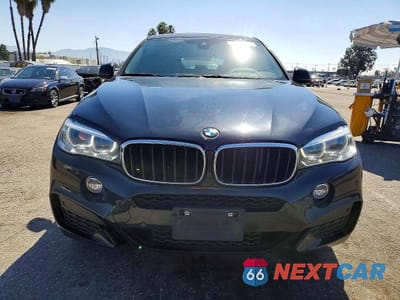 Piąte zdjęcie samochodu w środku: 2019 BMW X6 XDRIVE35I VIN:5UXKU2C54K0Z64876 - miniatura