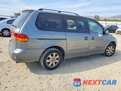 Trzecie zdjęcie samochodu z tyłu: 2002 HONDA ODYSSEY EX VIN:2HKRL186X2H511962 - miniatura