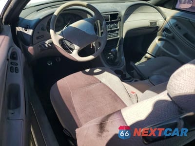 Zdjęcie 8 z 12 samochodu: 2000 FORD MUSTANG VIN:1FAFP4045YF221107 - miniatura